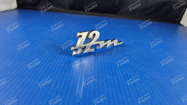 Sigle Heckabzeichen '12M'. - FORD Taunus 12M (P6) - 0