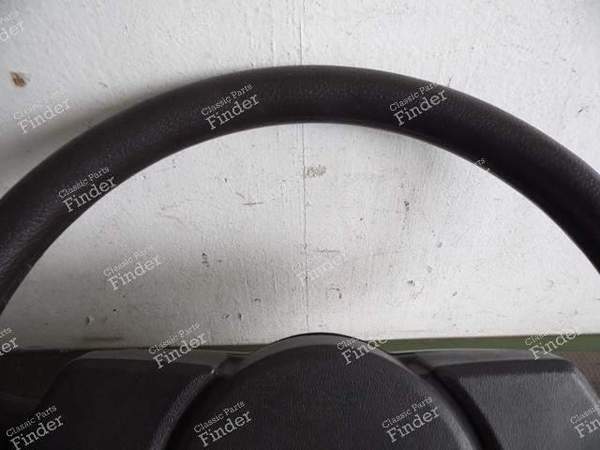 VOLANT 3 BRANCHES - PORSCHE 944 - 135415091B- 1