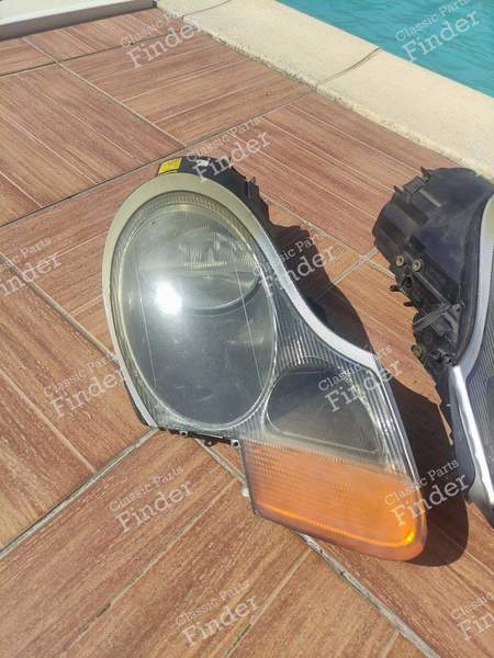 Pair of headlight lenses (right + left) - PORSCHE Boxter (986) - 0301096001 / 0301096002- 0