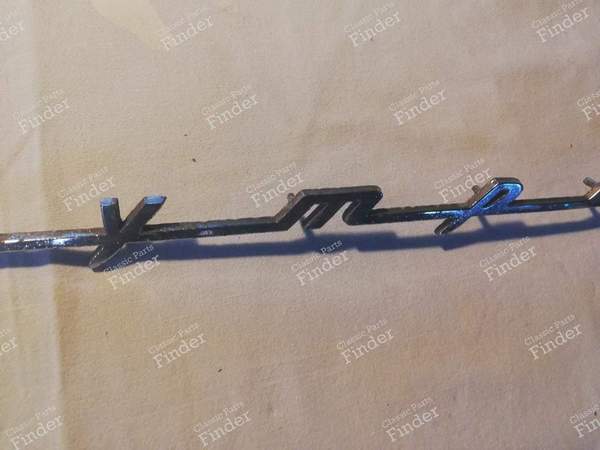 Inscription 'Olympia - OPEL Olympia Rekord - 6673350 (?)- 5