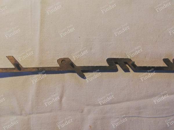 Inscription 'Olympia - OPEL Olympia Rekord - 6673350 (?)- 7