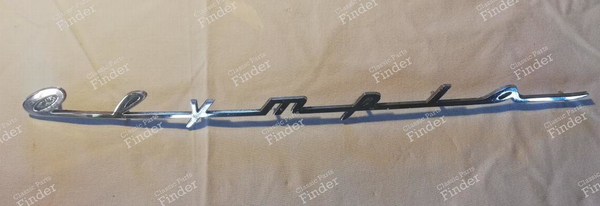 Inscription 'Olympia - OPEL Olympia Rekord - 6673350 (?)- 0