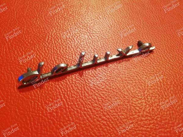 Deluxe' trunk sign - FORD Anglia 105E / Torino - RS 1004 E276-AM-I- 0