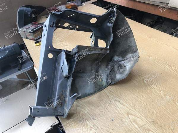 Support de phare / Face avant gauche - PEUGEOT 309 - 7113.57- 5