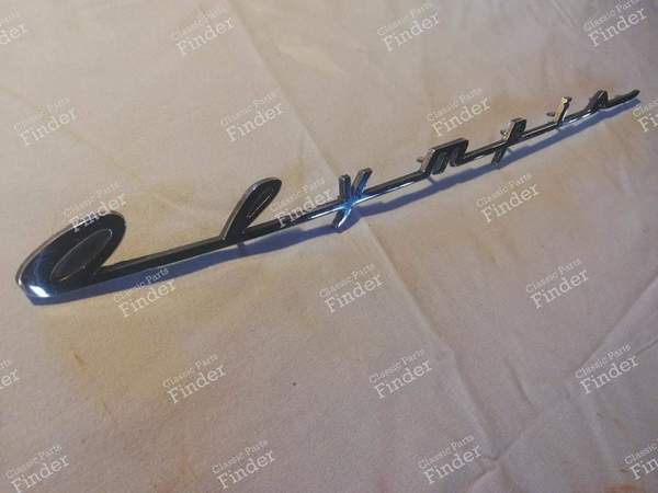 Schriftzug 'Olympia' - OPEL Olympia Rekord - 6673349- 0